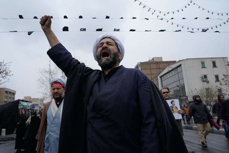 A cleric chants slogans during the annual anti-Israeli Quds Day, or Jerusalem Day rally in support of Palestinians in Tehran, Iran, Friday, March 13, 2026.