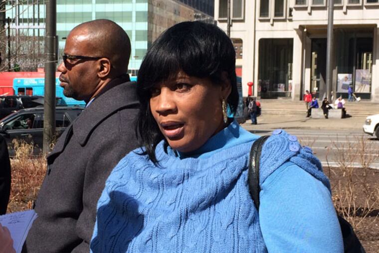 Tanya Brown-Dickerson after D.A. Seth Williams’ announcement: “I want you all to see what we three saw . . . and let the public and you make a decision.” (DAVID GAMBACORTA / DAILY NEWS STAFF)