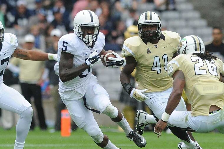 Penn State's DaeSean Hamilton tries to cut past Central Florida's Clayton Geathers during an NCAA college football at Croke Park Stadium on Saturday, Aug. 30, 2014, in Dublin, Ireland. AP Photo/York Daily Record, Jason Plotkin) YORK DISPATCH OUT