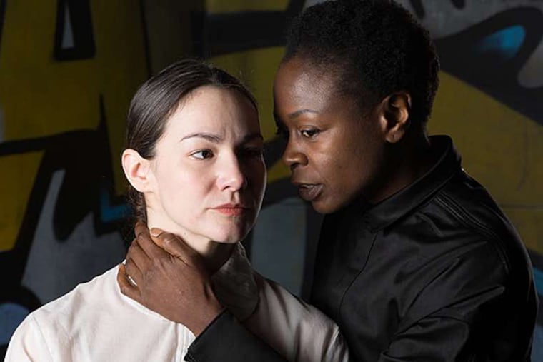 In "Hamlet," Zainab Jah (right) plays Hamlet, and Sarah Gliko is Ophelia. "I think Shakespeare would be used to women playing the part by now," says Wilma Theater artistic director Blanka Zizka. (ALEXANDER IZILIAEV)
