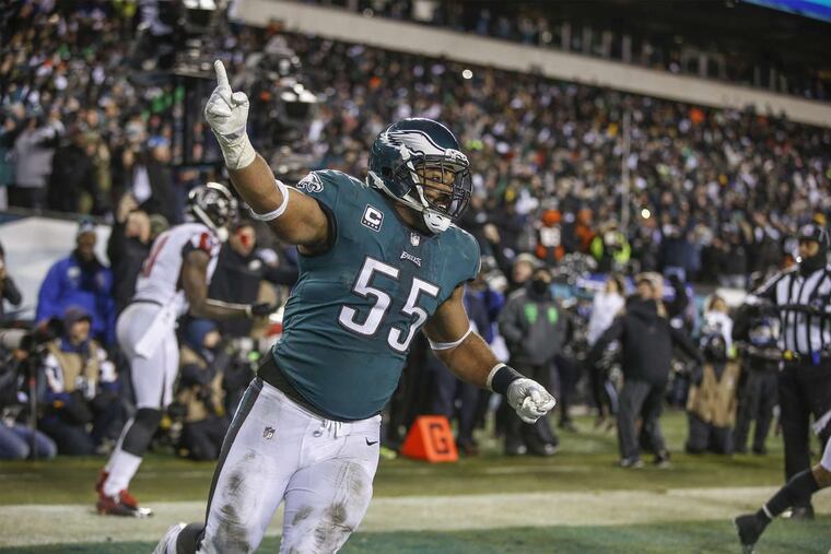 Eagles defensive end Brandon Graham celebrates after the Eagles’ sealed a win against the Falcons on Saturday.