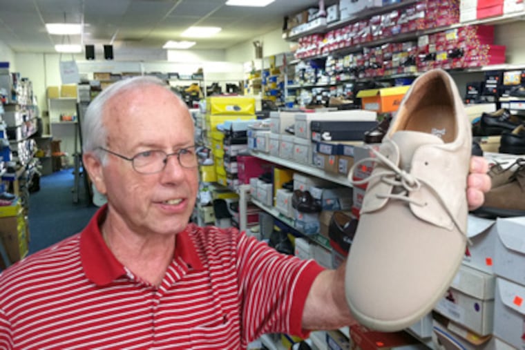 Ed Davis, who's been in the business nearly 60 years, owns the Shoe Horn in Medford. (Kevin Riordan / Staff Photographer)