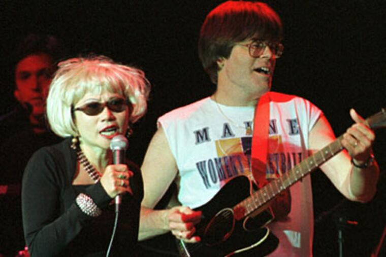 Amy Tan and Stephen King, and the rest of the authors who make up the Rock Bottom Remainders, will perform a benefit for the Free Library of Philadelphia and the libraries of the Philadelphia School District. (Michael C. York / AP)