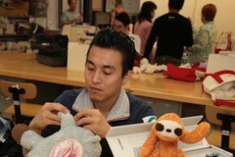 Sang Yoo Kwon works on a doll in Soft Toy and Doll Design class at Fashion Institute of Technology. Toy-design majors learn all about the industry, from manufacturing to business practices.