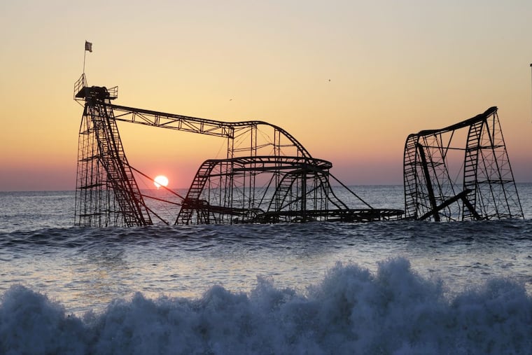 The famous view of the Seaside Heights roller coaster in the ocean.