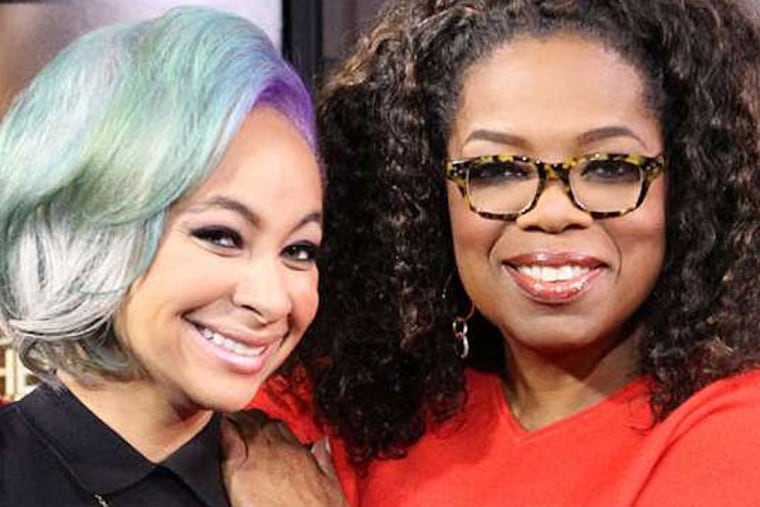 Oprah Winfrey with Raven-Symoné at a Sunday interview for "Oprah: Where Are They Now?" The actress' declaration that she is "American, not African American" has sparked a social-media backlash; Drexel professor Yaba Blay says Symoné has "rejected the identity that opened up many doors for her." (Harpo,Inc/George Burns)