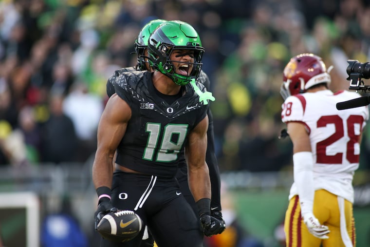 Oregon tight end Kenyon Sadiq celebrates after his touchdown against USC on Nov. 22.