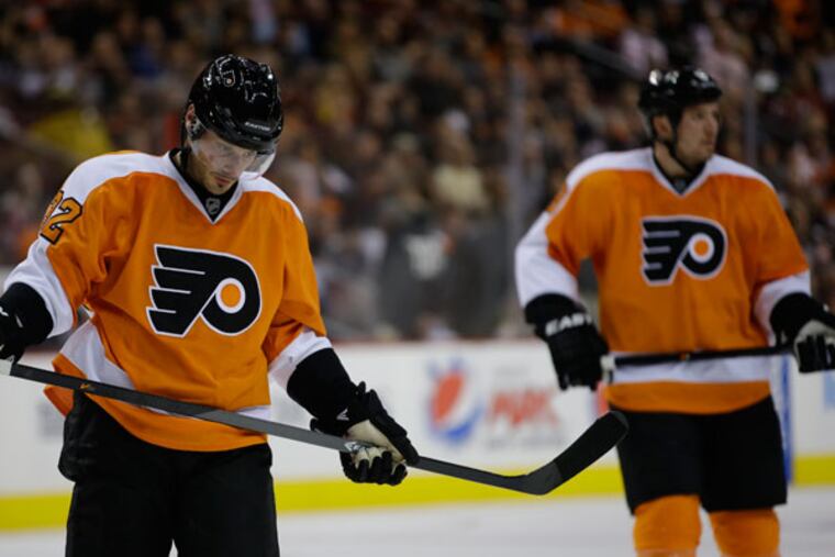 Mark Streit in action during an NHL hockey game against the New Jersey Devils, Thursday, Nov. 7, 2013, in Philadelphia. (Matt Slocum/AP)