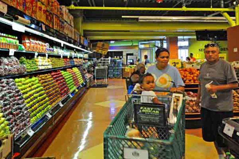 Newark, NJ on July 25, 2013. Here, a shopper at the Food Depot. ( APRIL SAUL / Staff )