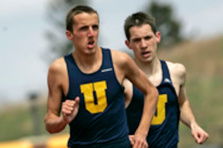 Unionville's Paul Springer, followed by teammate Sean Stellar, leads the pack in the 1,600 at the Bayard Rustin Invitational in early April.