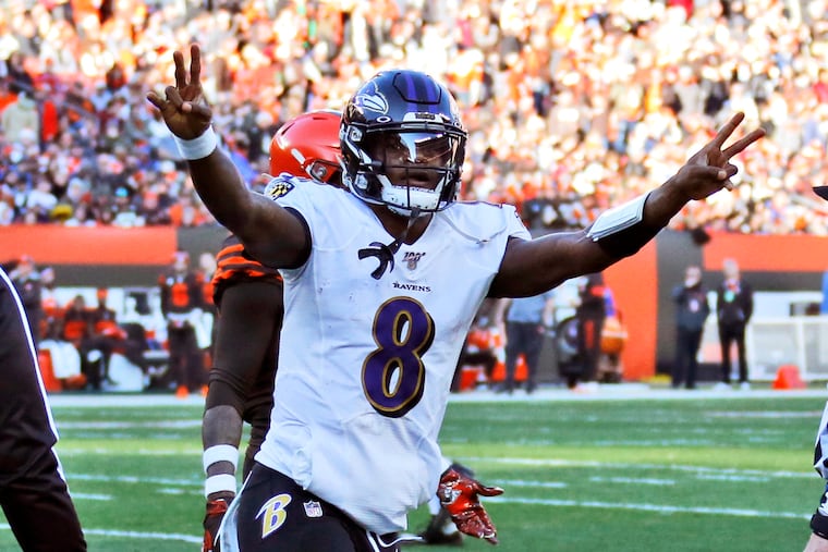 Lamar Jackson (above) and the Baltimore Ravens opened as 9.5-point favorites over the Tennessee Titans.