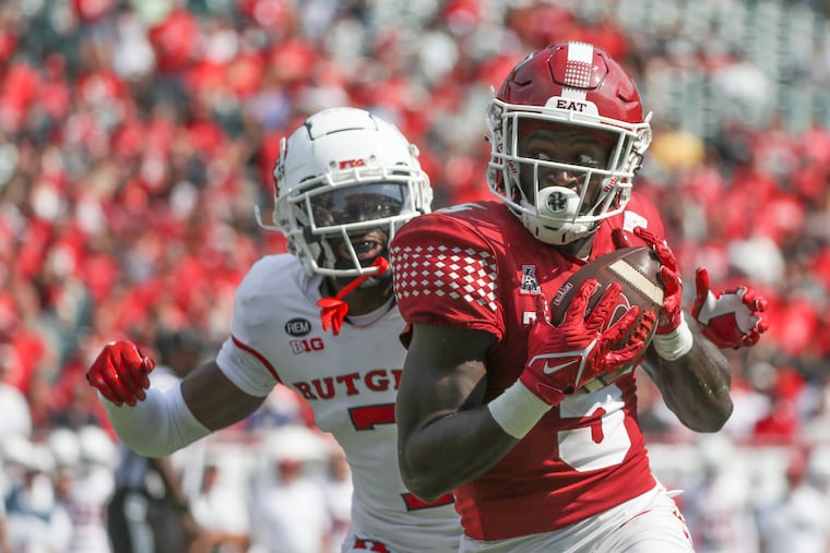 Temple wide receiver Adonicas Sanders runs past Rutgers defensive back Robert Longerbeam on Sept. 17.