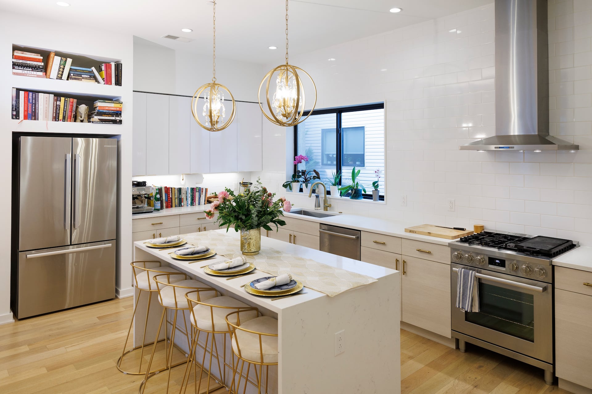 The mostly white kitchen of chef Scott Calhoun was designed by his wife, Lulu. "It’s like if Gwyneth Paltrow let her kids have sticky fingers,” she said.