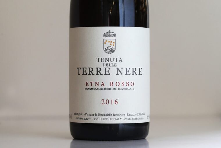 A 2016 bottle of Tenuta delle terre Nere Etna Rosso, a fresh bright red from Sicily.