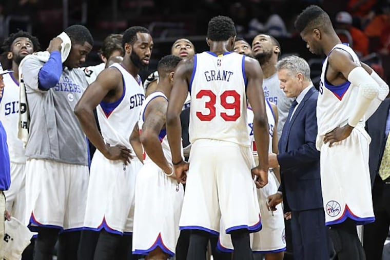 Sixers timeout against the Raptors. (Steven M. Falk/Staff Photographer)