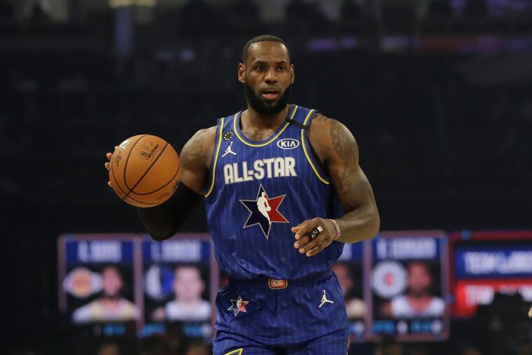 LeBron James of the Los Angeles Lakers dribbles during the first half of the NBA All-Star Game.
