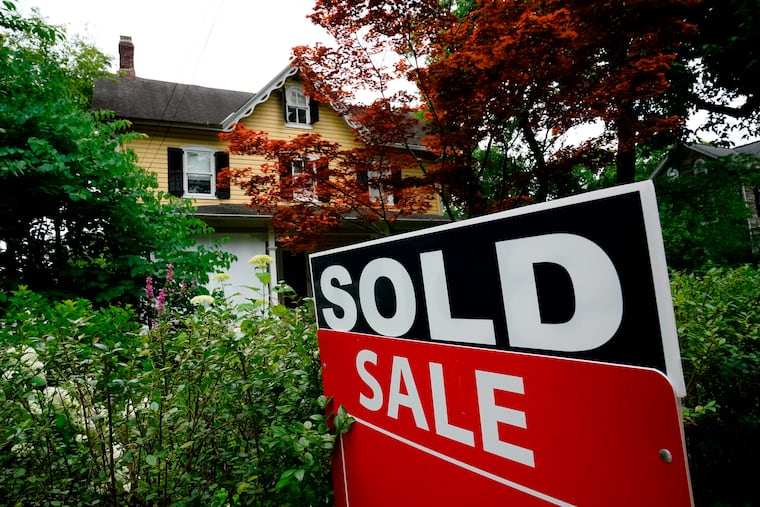 A sale sign stood outside a home in Wyndmoor in 2022.