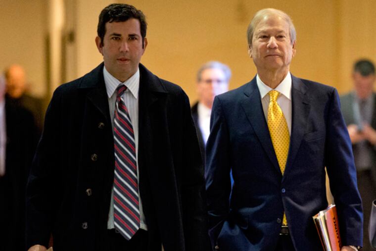 In this Nov. 13, 2013 photo, Drew Katz, left, and his father, Lewis Katz, walk to Judge Patricia McInerney's courtroom at City Hall in Philadelphia. (FILE: AP Photo/Matt Rourke)
