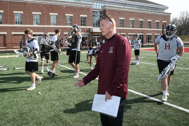 Haverford School lacrosse coach John Nostrant with his team at practice for feature about upcoming lacrosse tournament. , Wednesday, March 20, 2019.