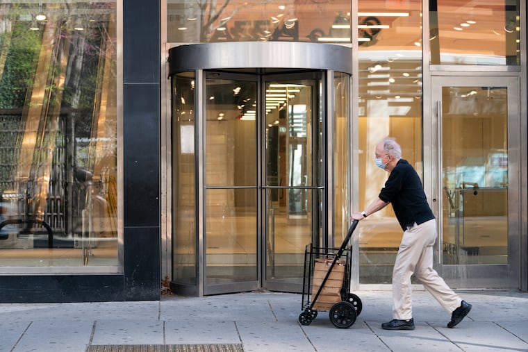 A shopper walks past Forever 21 on Chestnut Street in Philadelphia in 2020. Forever 21 filed for bankruptcy in 2019 and closed many of their stores including this one.