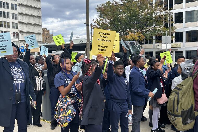 Students and supporters of Black-led charters rally outside the Philadelphia school board meeting on Thursday.