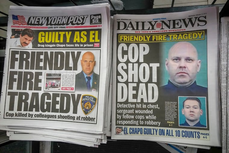 Headlines of the New York Daily News and the New York Post on Wednesday, Feb. 13, 2019, report on the death of NYPD Detective Brian Simonsen by friendly fire during a previous day's robbery of a T-Mobile store in Richmond Hill, Queens. The suspect jailed for murder in Simonsen's death said it was a prank gone wrong. (Richard B. Levine / Sipa USA / TNS)