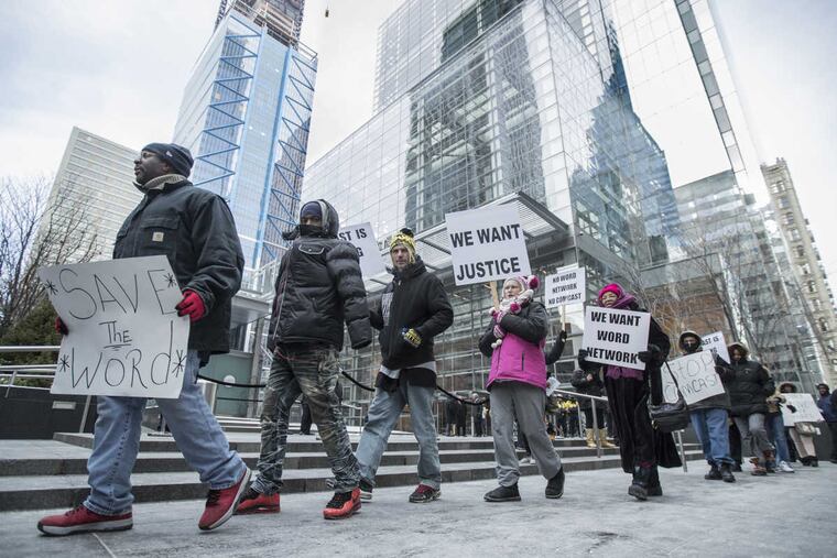 Chanting slogans and carrying signs, members of the All Gods People Church from Detroit, Michigan protest outside the Comcast Building in the hopes of having Comcast not drop the Word Network from its lineup.