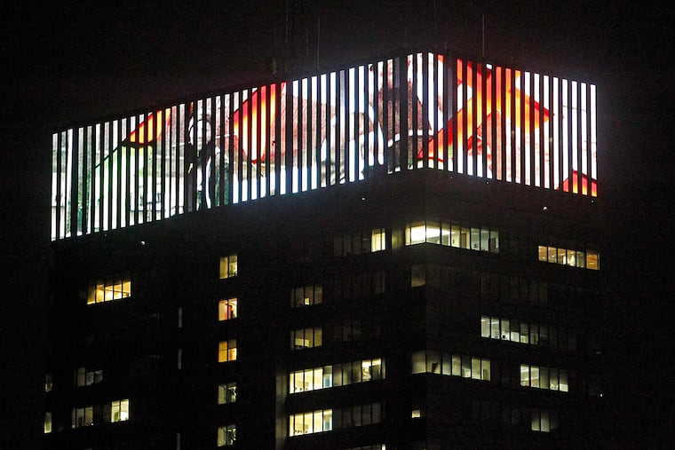 A light art display atop PECO's crown lights on Sept. 16, 2011. (Akira Suwa / Staff Photographer )