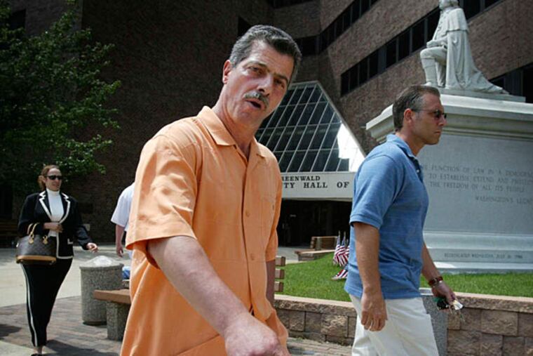 Ex-Philly mob underboss Joseph "Mousie" Massimino, seen here after a 2004 sentencing in Camden County, was sentenced Thursday by a federal judge to 15 years, 8 months in prison for racketeering. (Alejandro A. Alvarez/Staff)