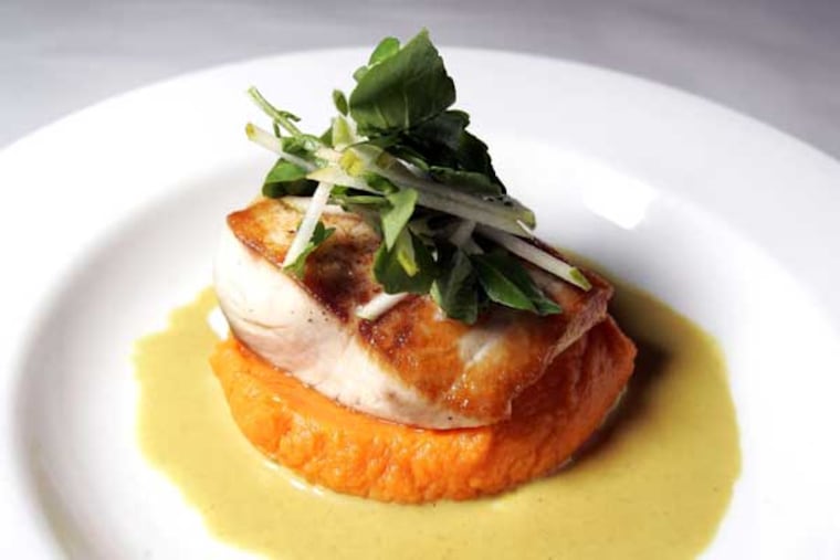 Mahimahi with sweet potato and Madras curry at Little Fish, where it's hard not to be charmed.