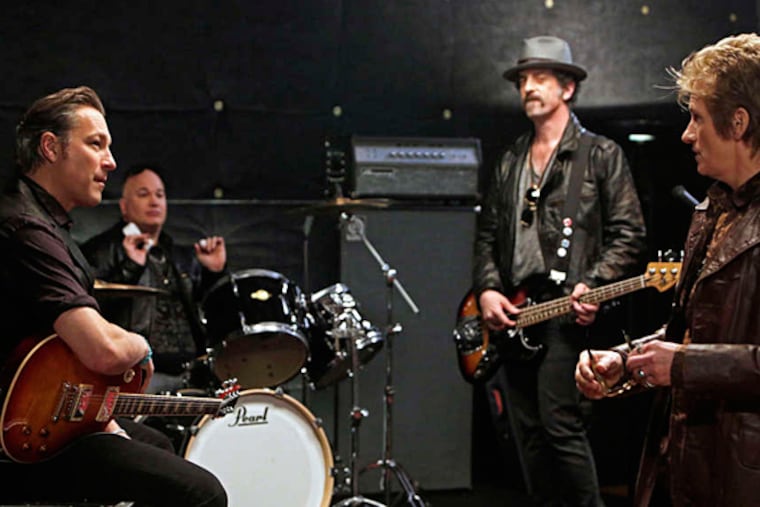 Although Dennis Leary (right) is the topliner, his new series benefits greatly from the smooth and believable performance of John Corbett (left). (Patrick Harbron/FX)