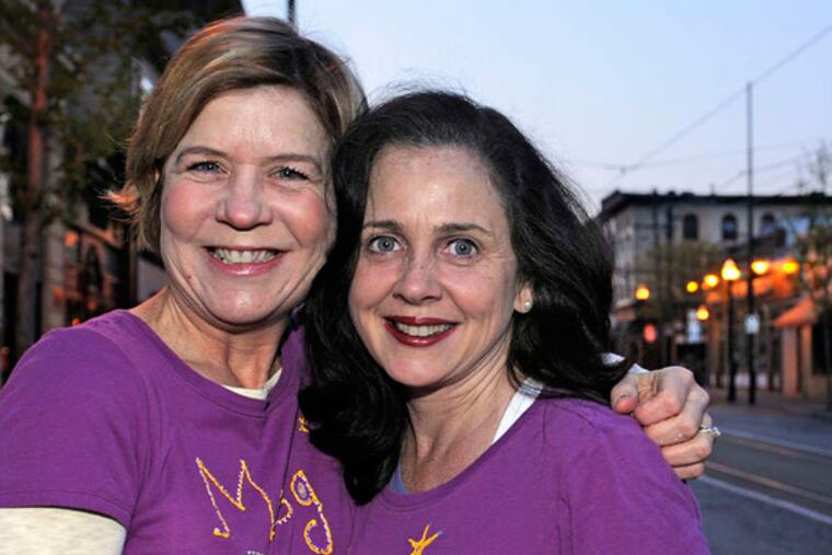 Best friends Meg Kearney (left) and Meg Grant-Bradley pause before a training run in Media. Now 48, they have been friends since they were 3 and will run the Broad Street Run together on May 5. (Tom Gralish / Staff Photographer)