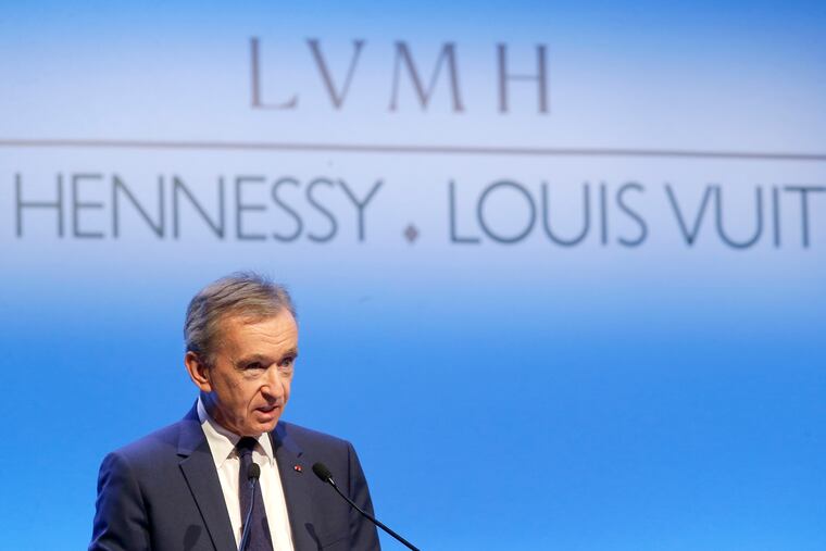 FILE - In this Jan.25, 2018 file photo, CEO of LVMH Bernard Arnault presents the group's 2017 results in Paris, France. French luxury group LVMH has agreed to buy iconic New York jeweler Tiffany & Co. for $16.2 billion, adding a famed star to its portfolio that already boasts Louis Vuitton, Christian Dior and Bulgari.