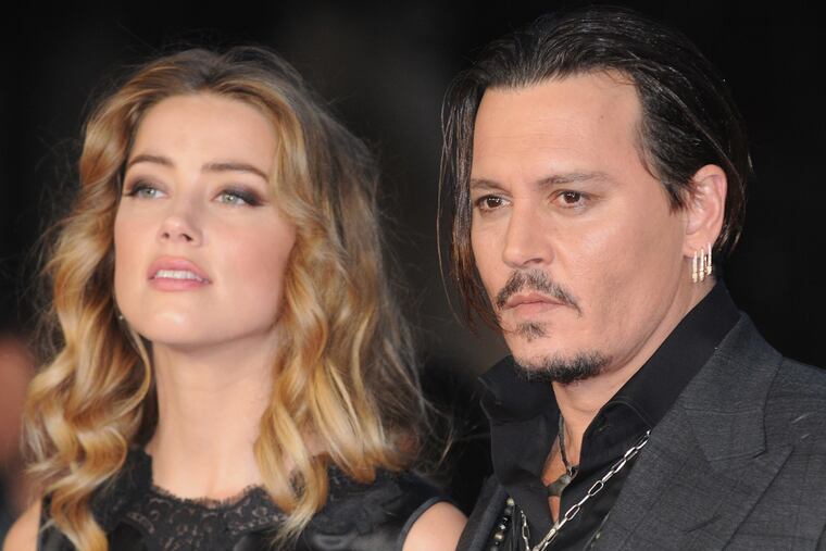 Amber Heard and Johnny Depp, here in London in October 2015, divorced after just 15 months of marriage. (Michael Melia/UPPA/Zuma Press/TNS)