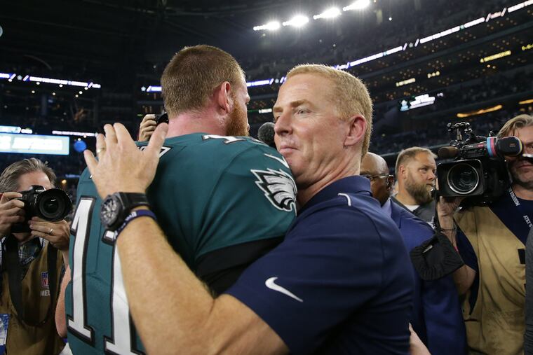 Jason Garrett hugs Carson Wentz after his Cowboys destroyed Wentz and the Eagles, 37-10.
