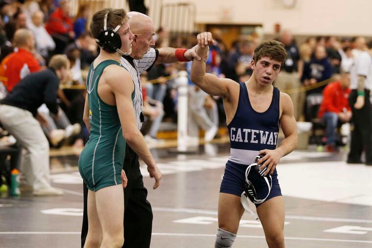 Gateway's Antonio Mininno (right) is the winner of the 113-pound Region 8 quarterfinal over Clearview's David McCullough. His twin, Dante Mininno, won at 106. TOM BRIGLIA / For The Inquirer