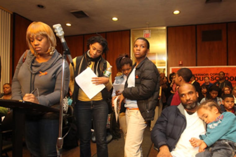 FILE: Parents, teachers, and concerned citizens turned out for a January 2012 meeting of the Chester Upland School Board to show their concern for the school district. ( Charles Fox / Staff Photographer )