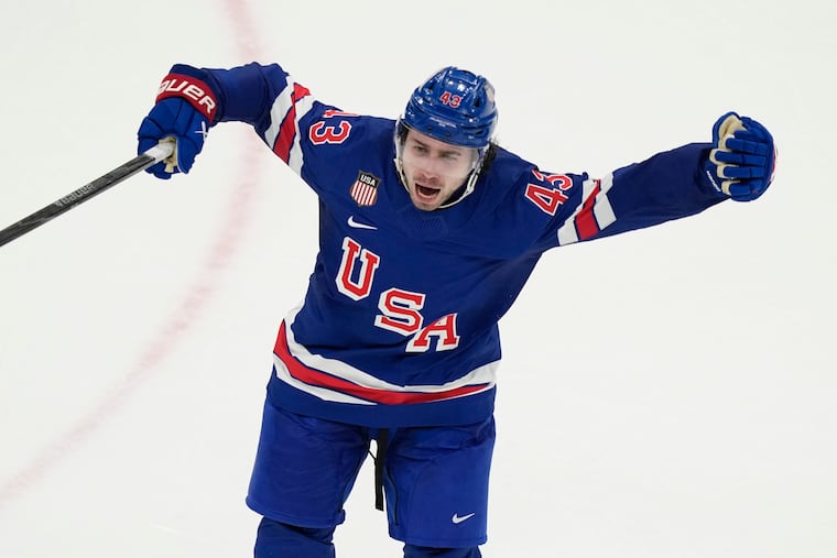Quinn Hughes celebrates after scoring the overtime winner for the United States against Sweden in the Olympic quarterfinals.