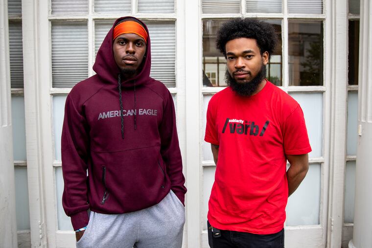 Jordan Purcell, 21, of Carlisle, Pa., a senior, (left), and Daniel Ross, 21, a senior from Philadelphia, (right), pushed back against Jefferson University's warning that students could be barred from classes if they don't pay outstanding bills. Here, they stand outside the Robert J. Reichlin House on campus Thursday, Oct. 3, 2019.