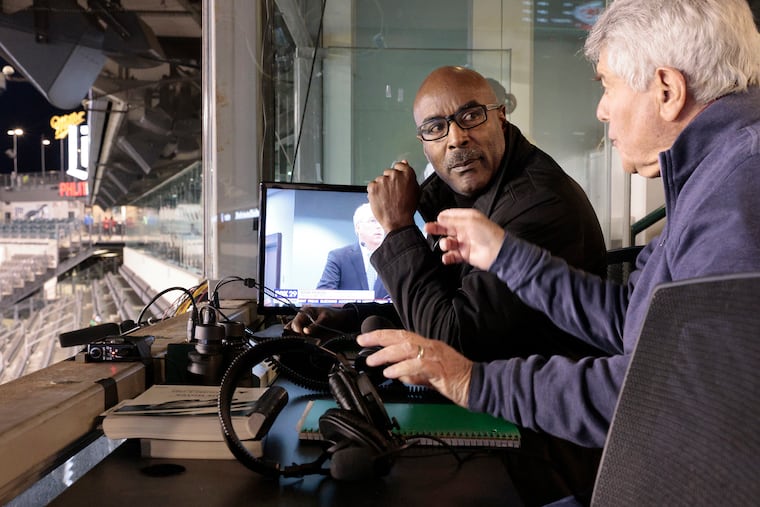 Eagles radio announcers Mike Quick (left) and Merrill Reese.