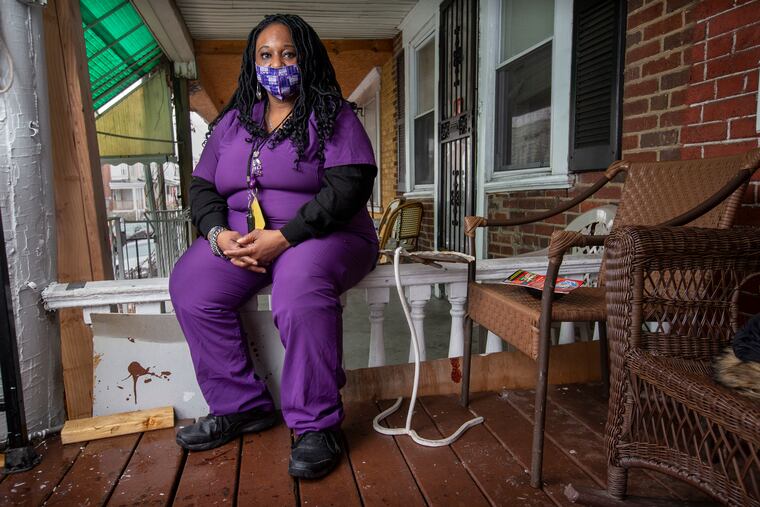 Lolita Owens, a Philadelphia home health aide, has counseled coworkers to get vaccinated.