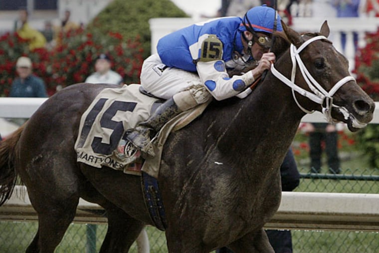 Smarty Jones with Stewart Elliott aboard drives to the finish to win the 130th Kentucky Derby at Churchill Downs in Louisville, Ky on Saturday, May 1, 2004. (Amy Sancetta/AP)