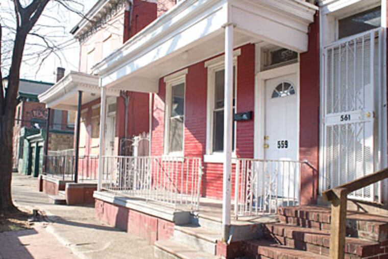 The Camden rowhouse where the couple was tortured. A girl, 14, pleaded guilty to aggravated manslaughter today. (Ed Hille / Staff Photographer)