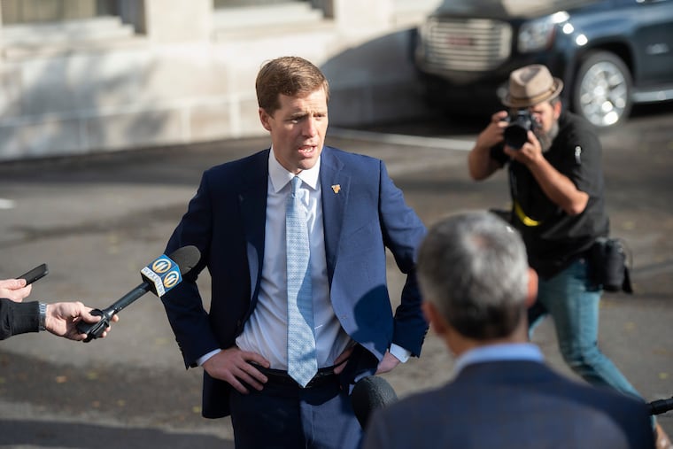 Then-Rep. Conor Lamb speaks to the media at his polling station during the 2022 primary.