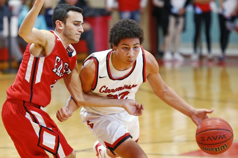 Craig Turner scored 20 points in Cinnaminson’s 46-32 win over Pennsauken Tech Monday. Pictured is Turner (right) against Cherry Hill East on Jan. 27.