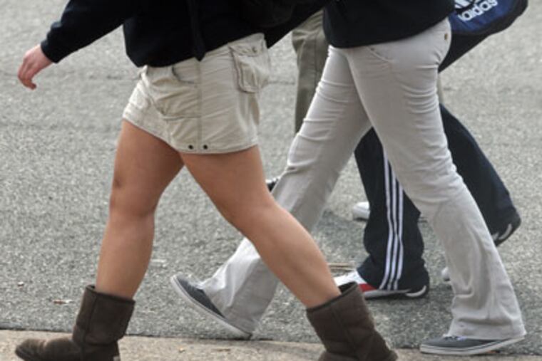 Upper Darby students walking on Lansdowne Avenue after school. March
15, 2011 (Sarah J. Glover / Staff Photographer)