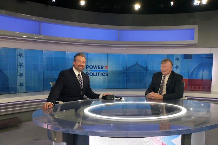 Former News 12 New Jersey reporter Alex Zdan (left) is seen in the studio.