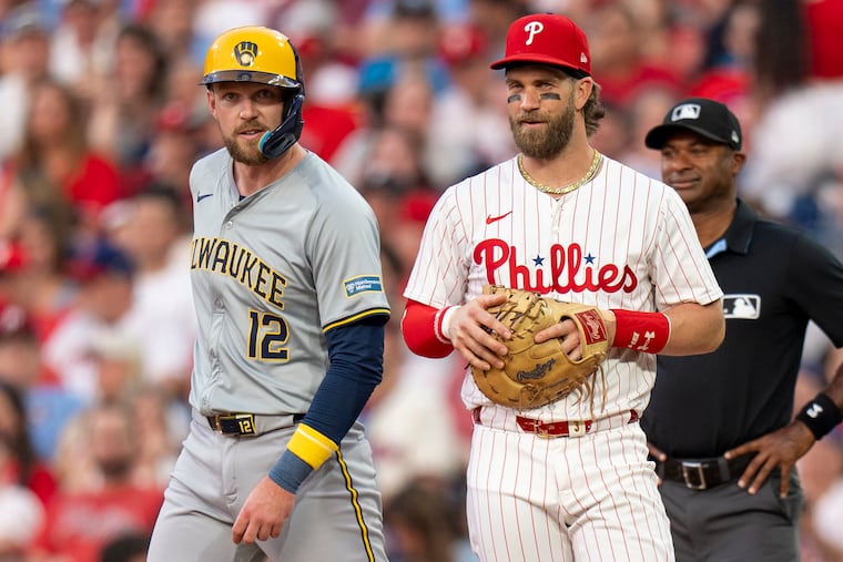 Rhys Hoskins (left) and Bryce Harper might still be teammates with the Phillies if Hoskins hadn't suffered a major knee injury in 2023.