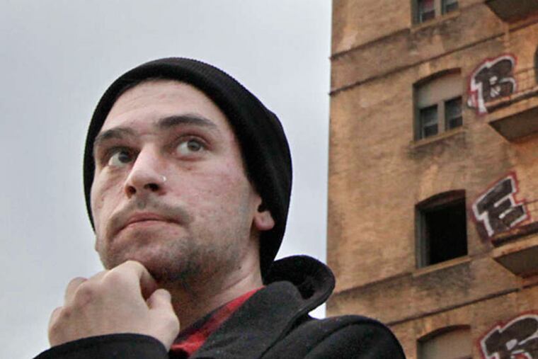 Brian Jerome outside the Divine Lorraine Hotel on October 23, 2012. ELIZABETH ROBERTSON / Staff Photographer
