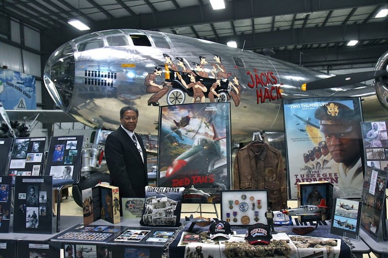 Bill Costen, an award-winning black hot air balloonist, with his traveling historical archive.